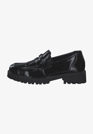 Black patent leather loafers with a chunky rubber sole, featuring a decorative strap across the vamp and a polished, high-shine finish.