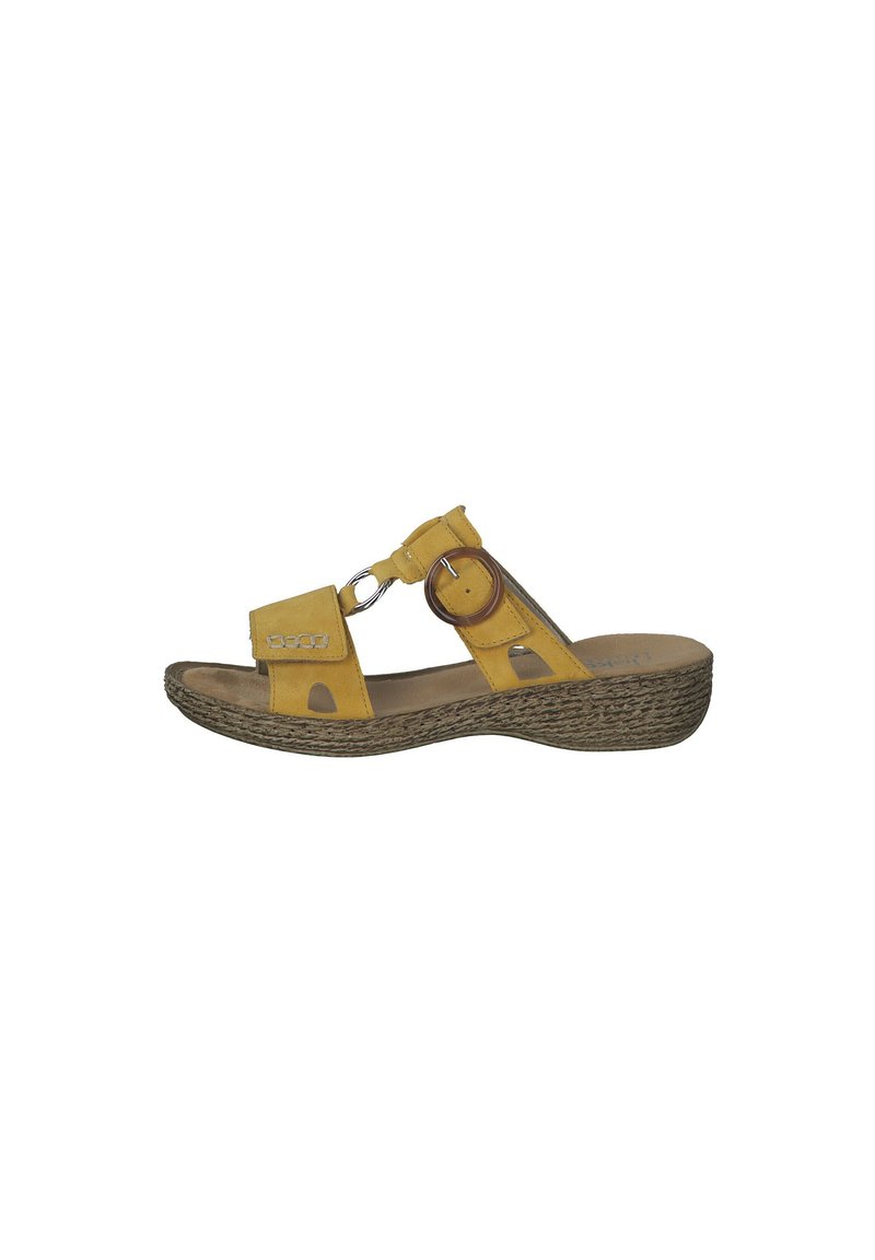 Yellow suede sandal with an open toe, two straps, a circular accent, and a textured wedge sole.