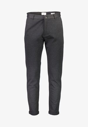 Pantalones ajustados grises con una textura suave, cierre de botón y puños enrollados. Hechos de una tela elástica para mayor comodidad y facilidad de movimiento.