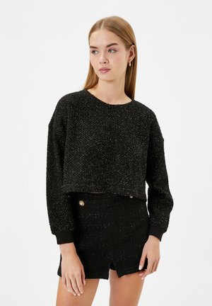 - Sweter