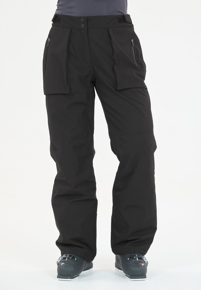 Pantalons de ski noirs en matériau durable, présentant un design à jambes larges, de multiples poches et une taille à deux boutons pour un maintien sécurisé.