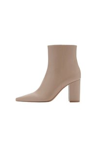 Členkové čižmy na vysokom opätku - beige