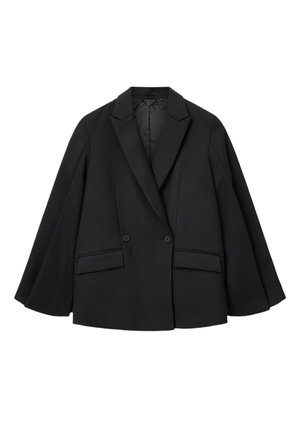 Veste noire croisée à revers à pointe, coupe oversize, et deux poches avant. Le tissu a une texture lisse avec un design structuré.