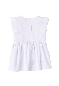 Witte mouwloze top met ruches op de schouders, knoopsluiting op de rug en geborduurde bloemenmotieven langs de zoom. Zachter katoenmateriaal.