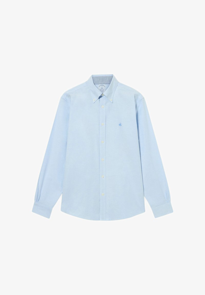 Světle modrá košile s dlouhými rukávy vyrobená z bavlny. Má límec s knoflíky, přední knoflíky a malé vyšívané logo na hrudi.