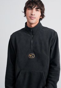 Nike Sportswear AIR - Φλις πουλόβερ - black/metallic gold
