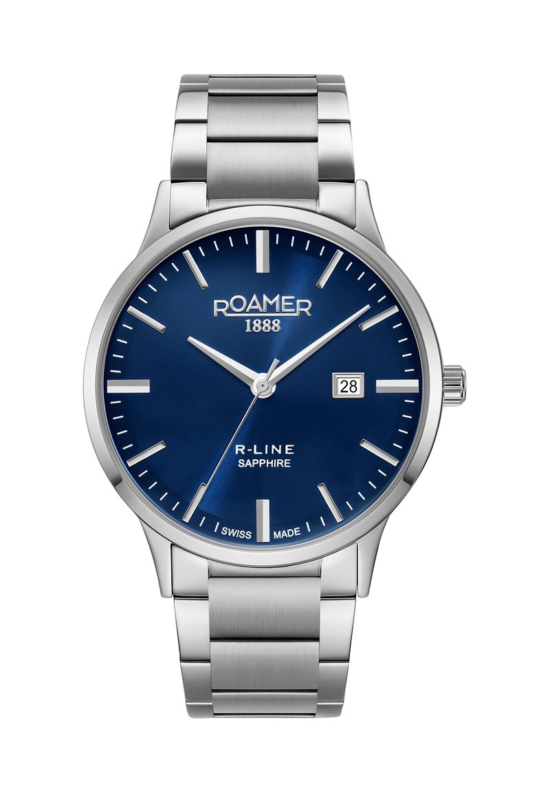 Reloj de acero inoxidable plateado con esfera azul, marcadores de hora plateados, fecha en tres en punto y cristal de zafiro. Modelo R-Line.