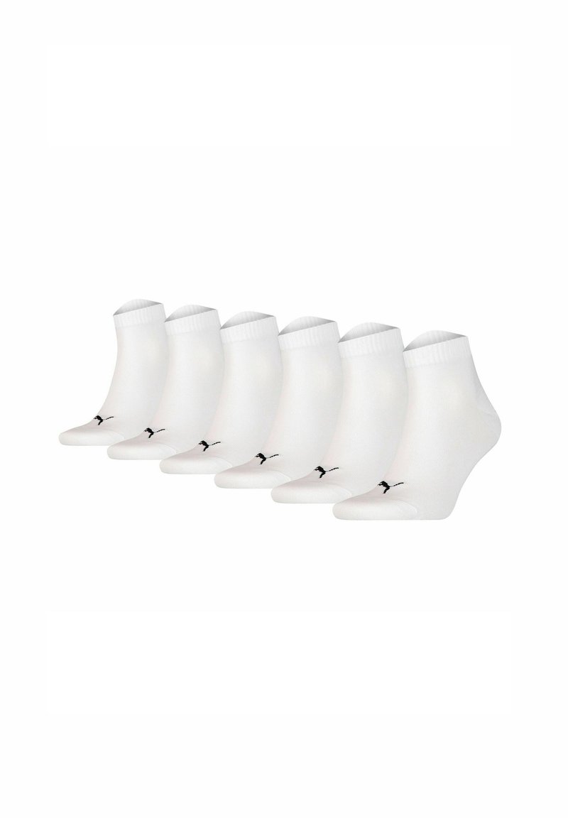 Six pairs of white ankle socks featuring a black logo, crafted from a smooth, stretchy material with a ribbed cuff for added comfort.
