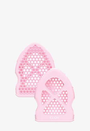 Roze siliconen schrobhandschoenen met een honingraattructuur en uitsparingen, met een gladde afwerking en GLOV-logo aan de zijkant.
