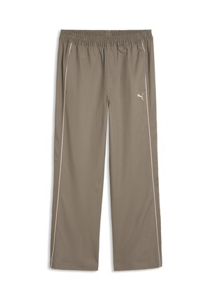 Jasnobrązowe spodnie dresowe Puma z elastycznym pasem, białymi paskami po bokach i logo Puma na prawej udzie.