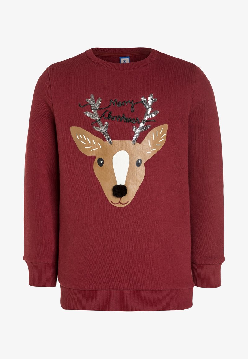 Pull rouge à manches longues avec visage de renne, bois scintillants, nez pompon noir et texte "Joyeux Noël" au-dessus de la tête.