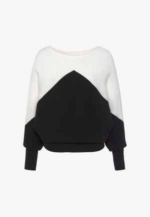 Strickpullover mit einem geometrischen Design, das einen weißen oberen Abschnitt und einen schwarzen unteren Abschnitt aufweist. Breite Ärmel und ein runder Ausschnitt.