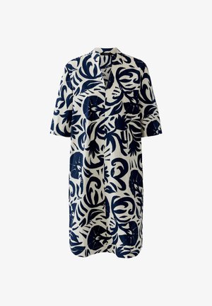 Witte jurk tot op de knie met marineblauwe tropische bladeren en abstracte patronen, korte mouwen, open voorkant en een kraag.