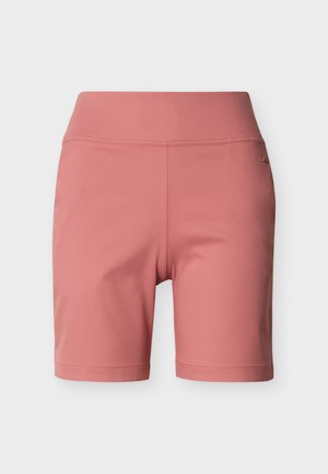 Αθλητικές σορτς γυναικείες, ψηλόμεσες, μήκους έως το γόνατο, σε απαλό ροζ χρώμα με λεία ύφη και διακριτικό λογότυπο στο πλάι, σε λευκό απλό φόντο.