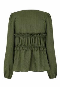 Green long-sleeve blouse featuring a ruffled waistline, textured fabric, and a gathered back design with subtle vertical seams.