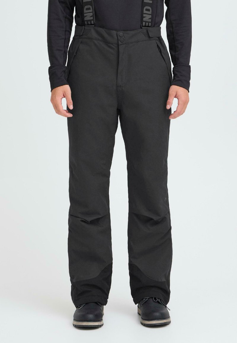 Black insulated pants with adjustable straps, zippered pockets, and a straight cut. Made from a durable, weather-resistant fabric.