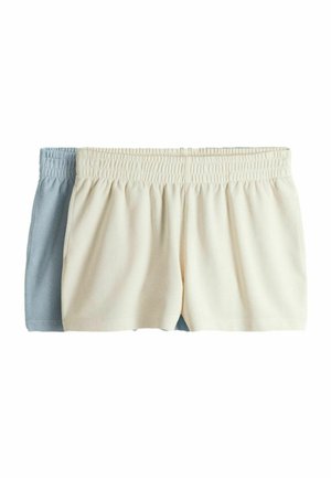 Due paia di pantaloncini con fascia elastica in vita, uno beige davanti e uno azzurro chiaro parzialmente visibile dietro, stesi su uno sfondo bianco.