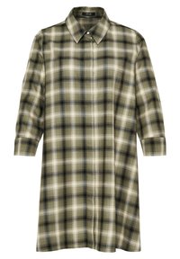 Vestido camisero a cuadros en verde y beige con cuello, botones en la parte delantera y mangas tres cuartos. Hecho de una tela suave con un corte relajado.