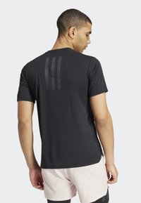 adidas Performance POWER WORKOUT - Sports T-shirt - black carbon
