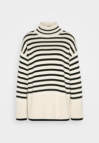 Pull à col roulé à rayures crème et noir, avec une coupe décontractée, un tricot texturé et des poignets côtelés. Muni de larges rayures horizontales audacieuses.