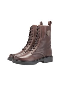 Bottines en cuir marron à lacets avec un bout arrondi, semelle rembourrée et un accent logo circulaire sur le côté extérieur. Fini texturé.