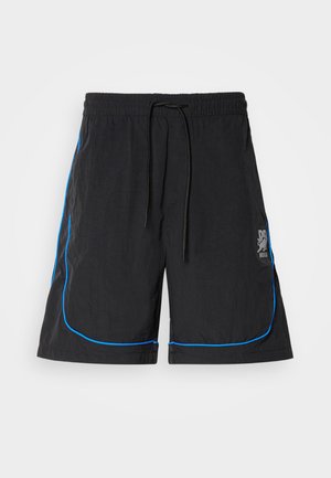 Sorte svømmebukser med snor i taljen, med blå piping langs sømmene og et logo på venstre lår. Letvægtsstof.