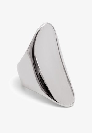 Polished silver ring with a sleek, elongated shape. Features a smooth, reflective surface and a tapered end with a subtle groove detail.