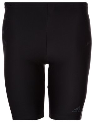Schwarze eng anliegende Adidas Sportshorts mit hoher Taille und Logo am unteren linken Bein.