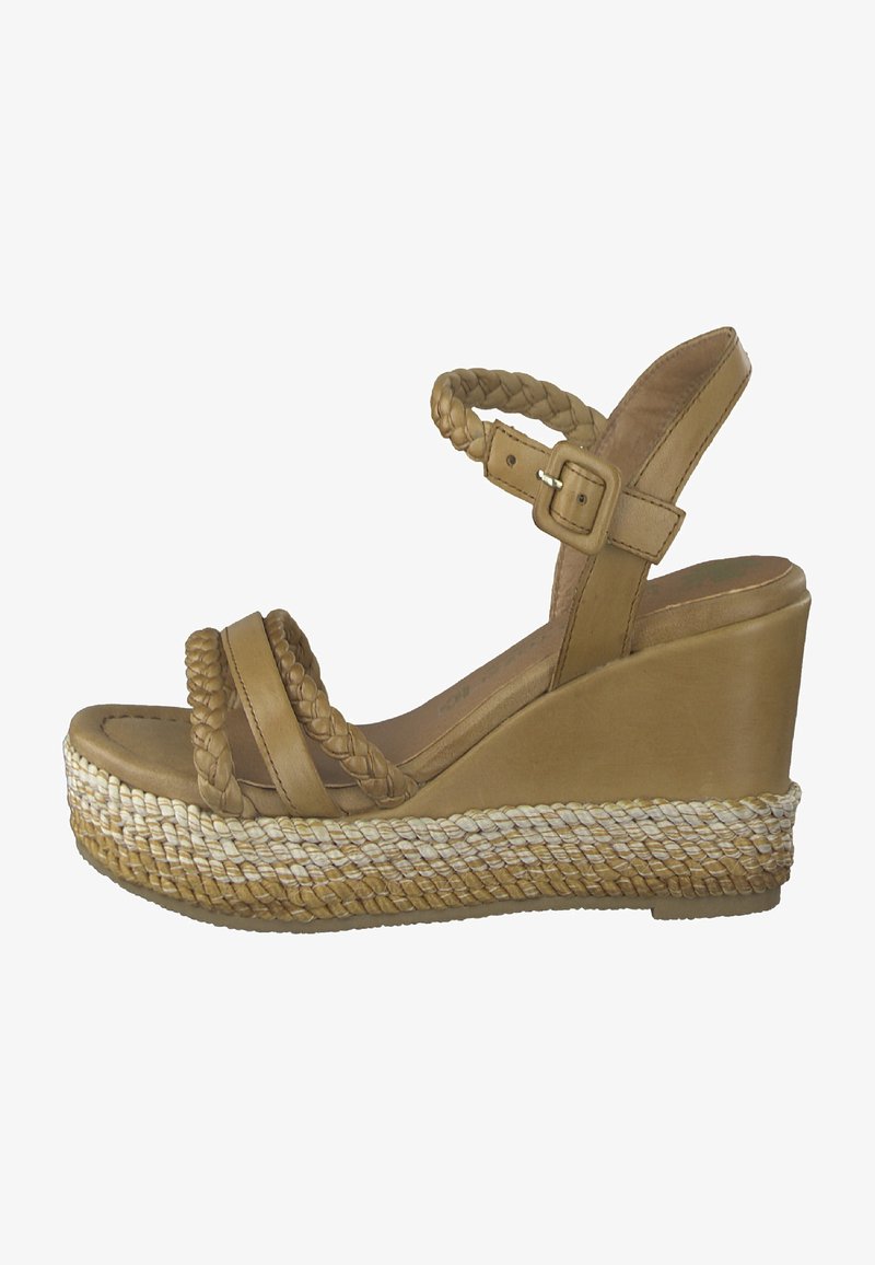 Sandalo con zeppa in pelle marrone chiaro, con cinturini intrecciati, una suola piatta in stile espadrillo testurizzata e una chiusura con fibbia alla caviglia.