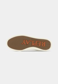 Brown rubber shoe sole with a textured pattern, featuring an orange "REPLAY" logo prominently displayed. White edging surrounds the sole.