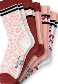 Collection of seven pairs of socks in various colors including pink, white, and red, with animal print patterns and contrasting striped tops.
