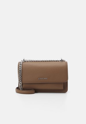 Brown leather crossbody bag with a textured finish, silver chain strap, and a flap closure. Features a branded logo on the front.