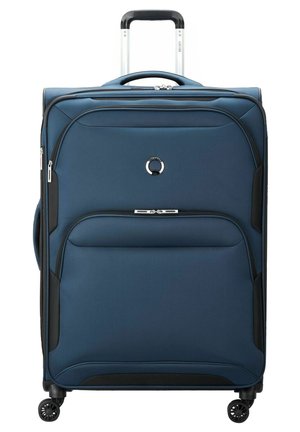 Navy blue rolling suitcase made of durable fabric, featuring a retractable handle, front pocket, and four spinner wheels for mobility.