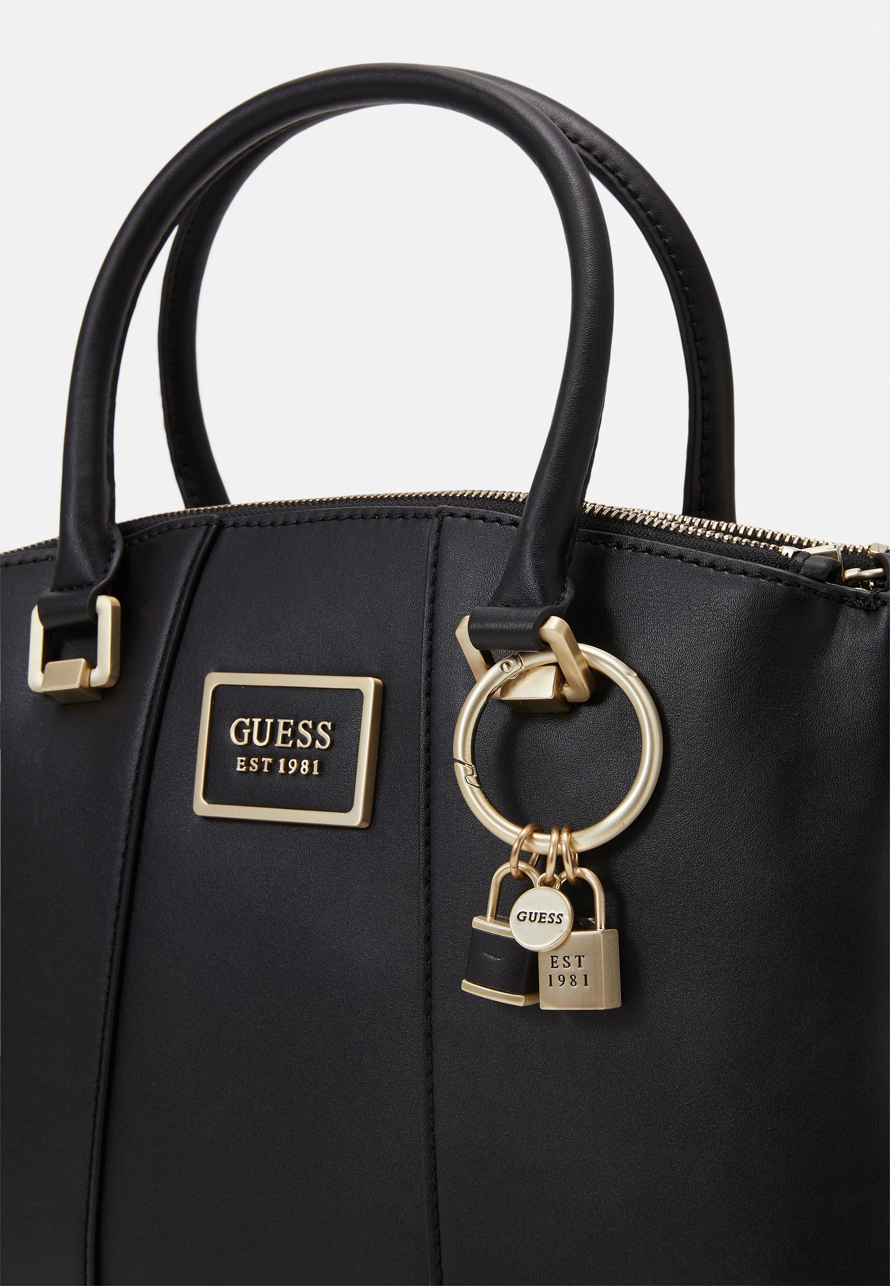 guess tyren status satchel