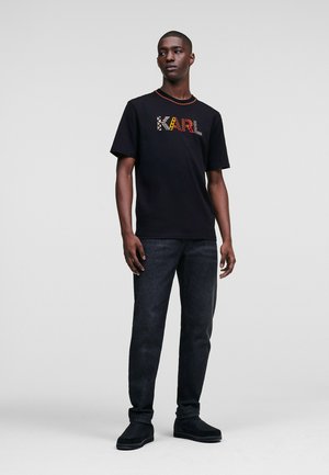 T-shirt con stampa - black