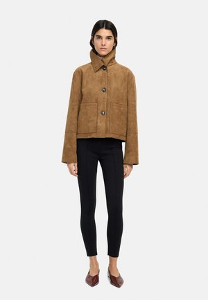 - Kurtka ze skóry ekologicznej