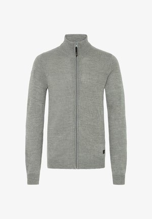 Hallika lukuga sviiter kõrge kaelusega, tekstuurse kudumisega kangas, pikad varrukad ning soonilised mansetid ja elastne äär. Omab sildiga logo äärmisel serval.