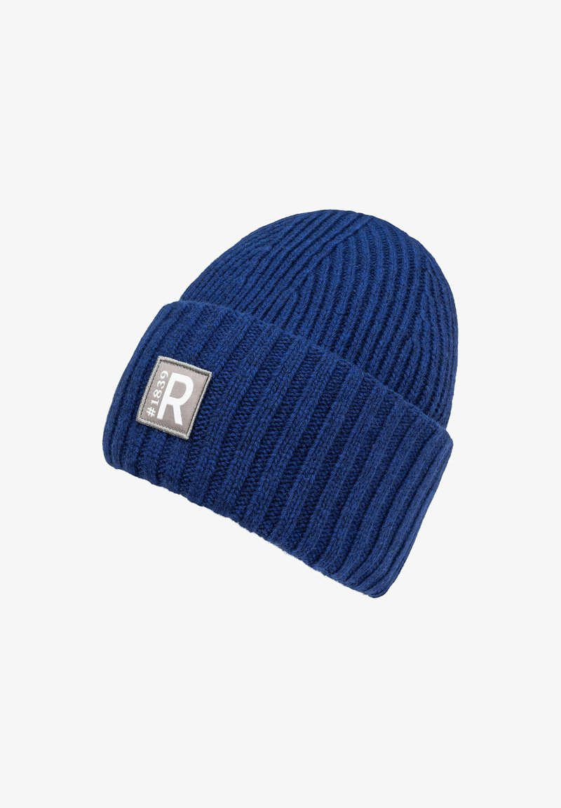 Knitted blue beanie hat with a ribbed texture, featuring a folded cuff and a rectangular gray patch with a white "R" logo.