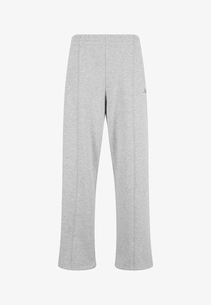 Lysegrå sweatpants lavet af blødt stof med en afslappet pasform, elastisk talje og diskret sidesøm-detaljering.