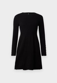 Robe noire en maille côtelée à manches longues avec corsage cintré, jupe évasée, encolure ronde et boutons décoratifs aux poignets.