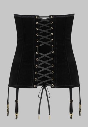 Corset en velours noir avec laçage frontal, œillets dorés et quatre bretelles porte-jarretelles réglables avec crochets dorés, sur un fond gris.