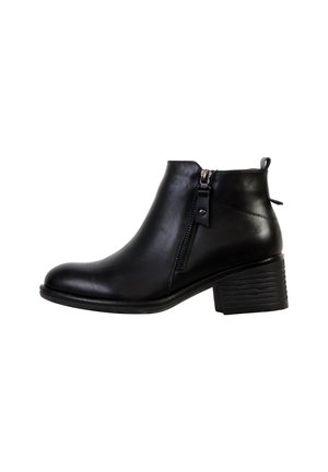 Black leather ankle boot with a rounded toe, side zipper, and stacked heel, featuring a smooth texture and minimalist design.