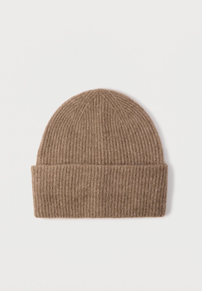 Brown ribbed knit beanie hat with a fold-up cuff. Made from soft wool material, features a snug, rounded top shape and textured pattern.