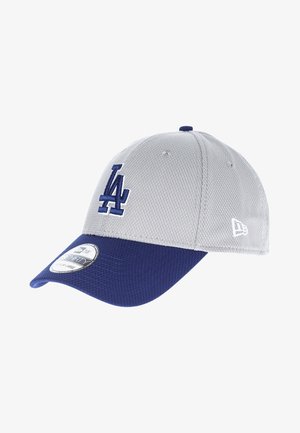 Graue und blaue Baseballkappe mit "LA"-Logo auf der Vorderseite und New Era-Logo an der Seite, mit gebogenem blauen Schirm und Netzstoffstruktur.