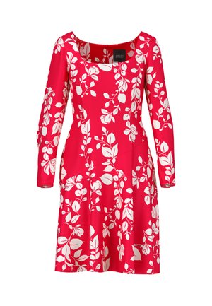 Red dress with long sleeves, square neckline, and a fitted bodice. Features a white floral pattern; smooth fabric and flared hem.