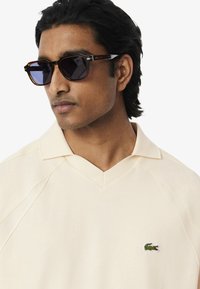 Lacoste SHORT SLEEVES - Piké - blanc écru xfj