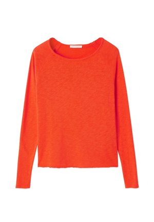Długi rękaw, w jasnopomarańczowym kolorze, wykonany z miękkiego materiału. Posiada okrągły dekolt i lekko skrócony dół z teksturowanym wykończeniem.