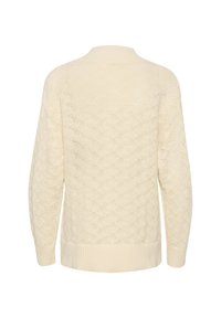 Licht crème oversized gebreid sweater met een textuur golfpatroon, verlaagde schouders en ribgebreide manchetten. De achterkant benadrukt het ingewikkelde ontwerp.