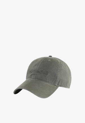 Casquette de baseball Timberland verte avec une visière incurvée et un logo brodé à l'avant.