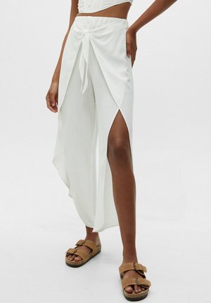 FLOWING - Trousers - white
